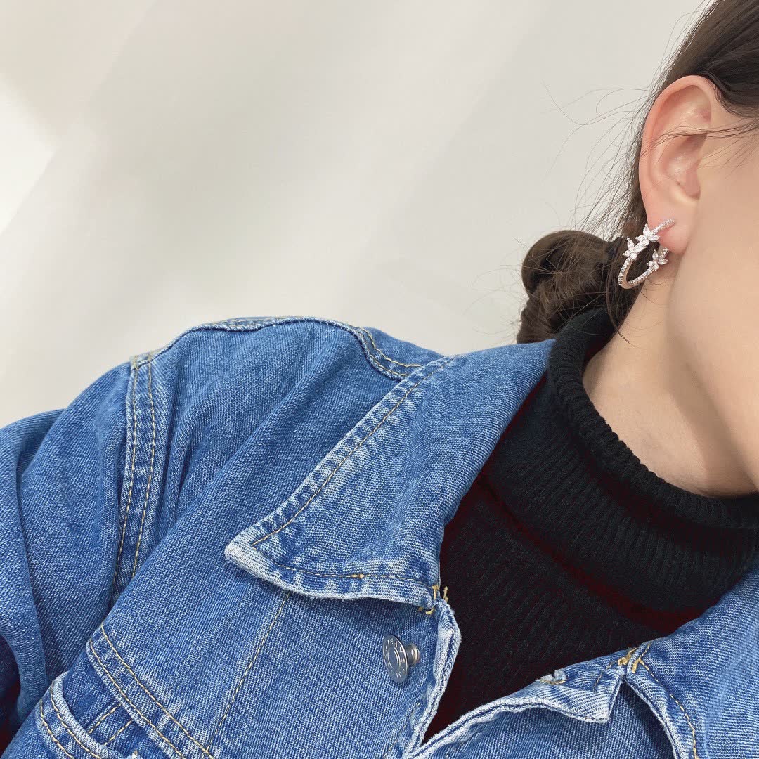 APM Monaco Silver Hoop Earrings with Butterfly Design